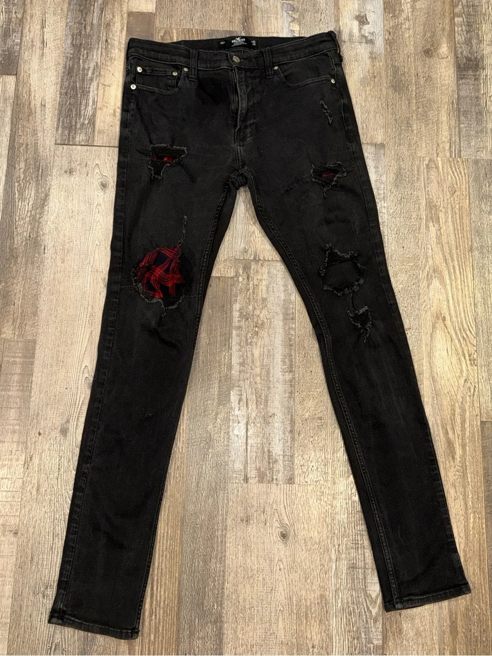Men’s Hollister Black Stacked Skinny Jeans with Red Plaid Patch